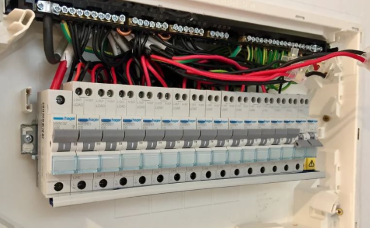 Electrician performing a Switchboard upgrade and repair in Camden